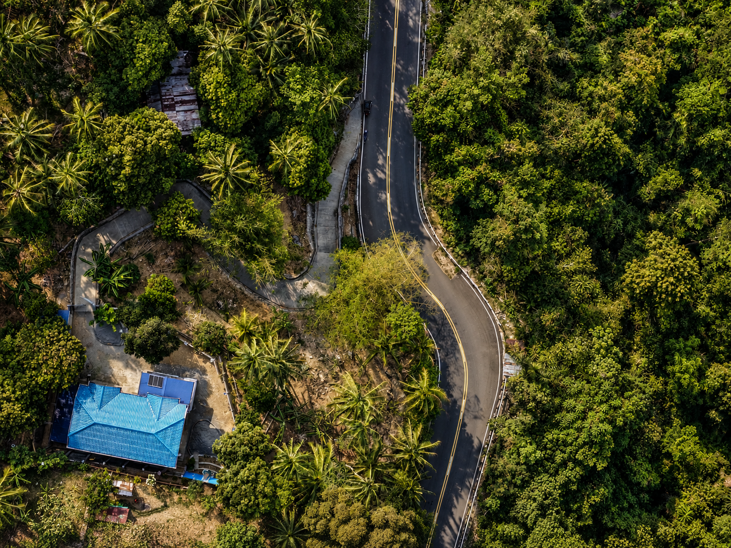 Aerial view showing the property beside the paved national road in Puerto Galera
